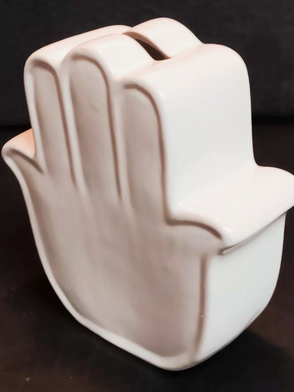 Hamsa hand bank, white ceramic with plug. Dimensions: 4.5 x 4.5 x 1.5.